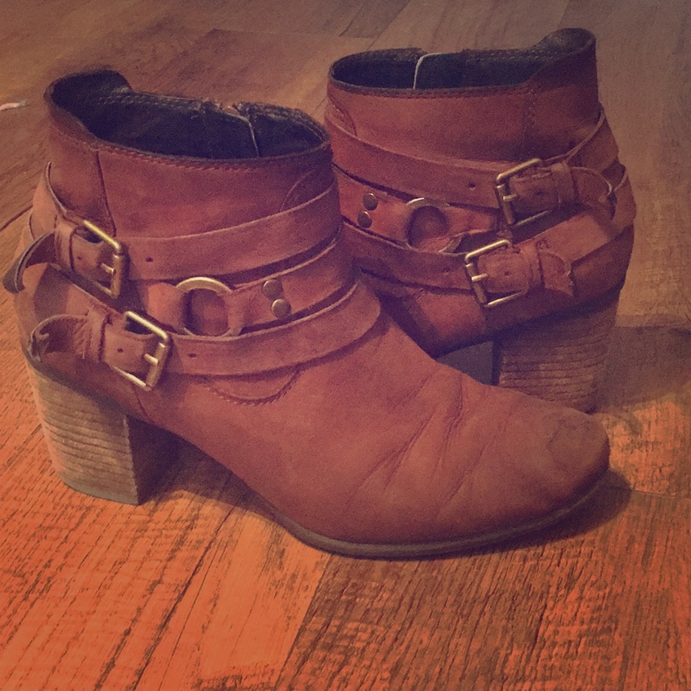 Brown leather, western style ankle booties.